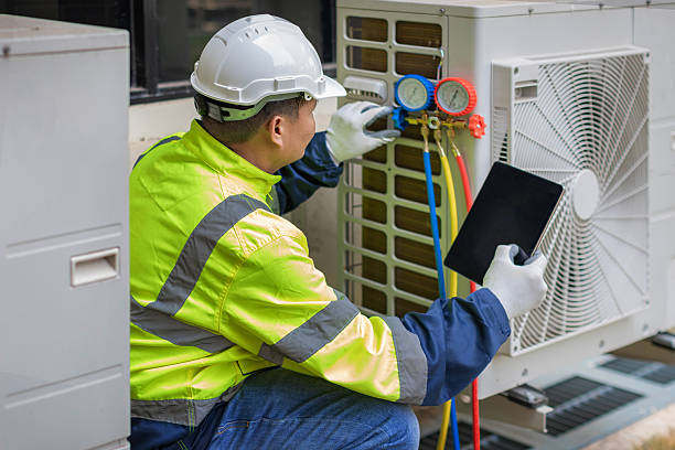 Professional Heat Pump Repair technician working in Finksburg, MD